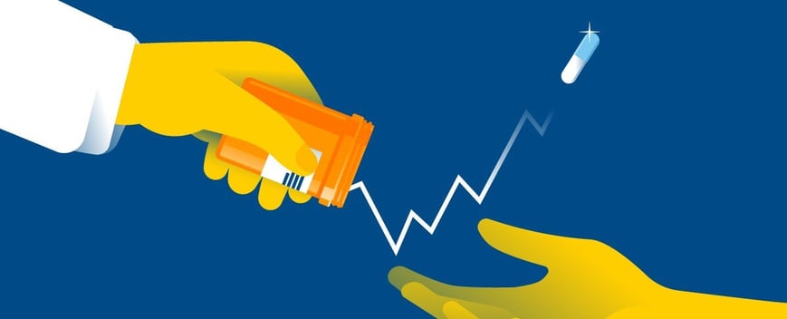 One hand dispenses pills into another over a dark blue background.